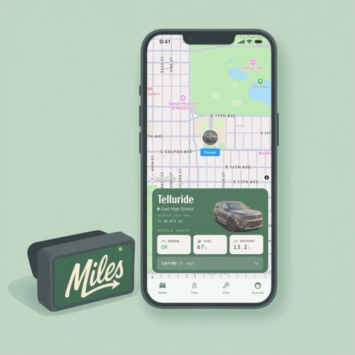 The Miles app open beside a car in a driveway